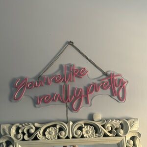 A neon sign that you can hang up works perfectly, barley use